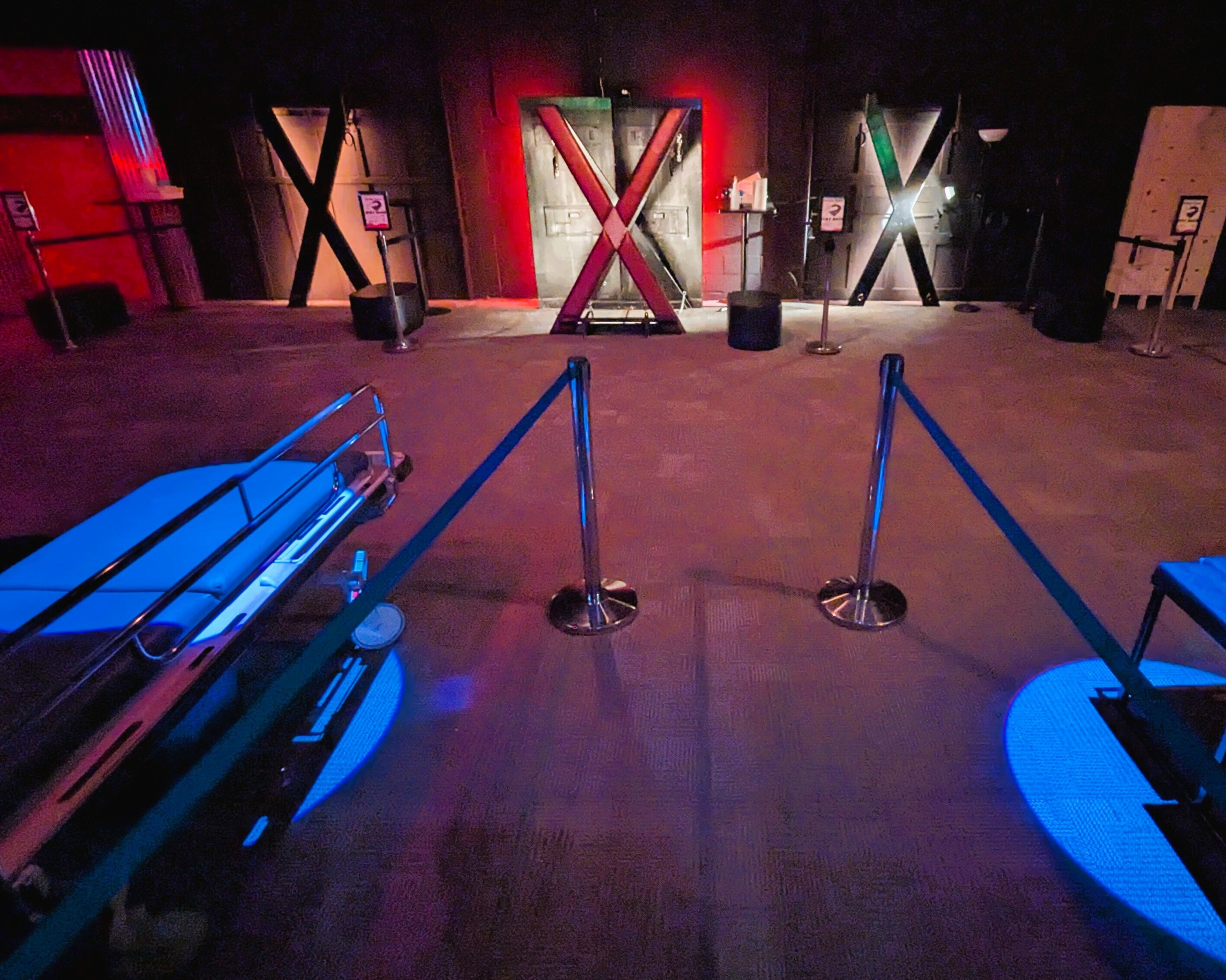 Dungeon-style play space with equipment and mood lighting