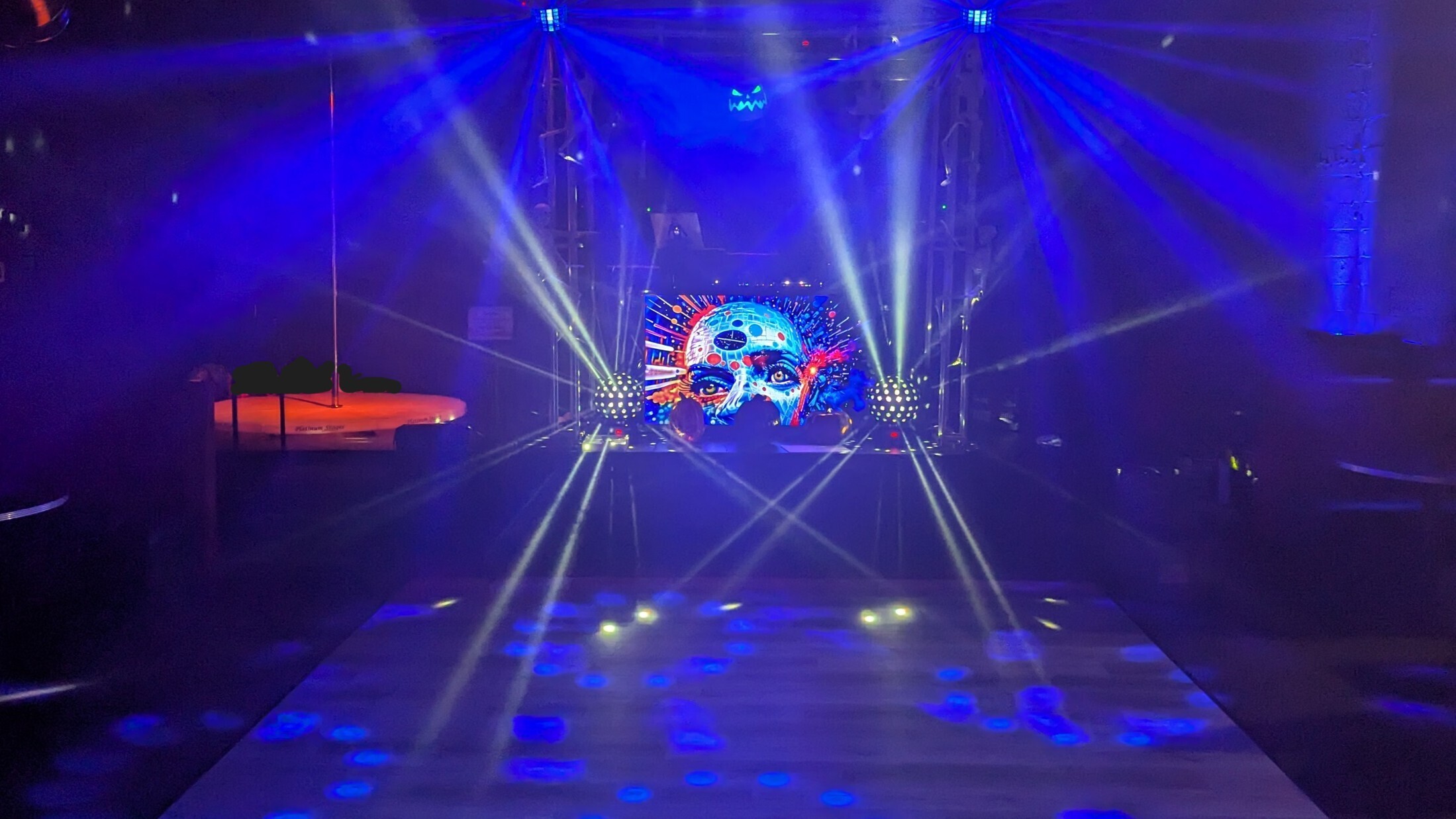 Glow party lighting on the dance floor at The Shop