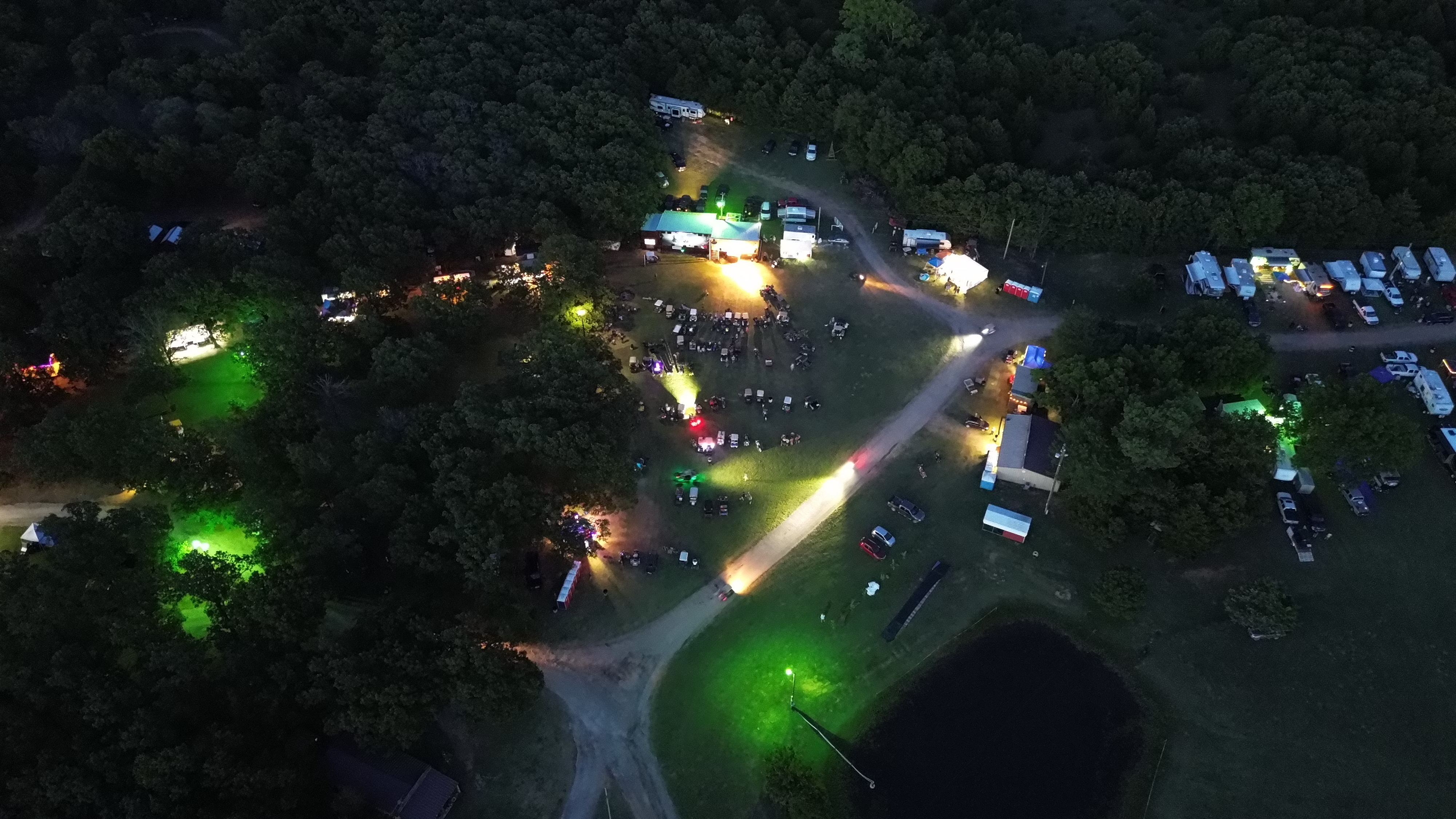 An aerial evening view of festival camping